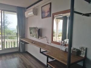 Kuchyň nebo kuchyňský kout v ubytování Pimpimarn Hotel