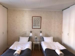 Postel nebo postele na pokoji v ubytování Skärplinge Gästis B&B