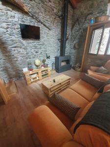 TV a/nebo společenská místnost v ubytování Casa Garrabet