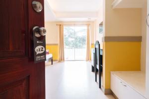 Voodi või voodid majutusasutuse RedDoorz Premium @ Gabinete Road Palawan toas