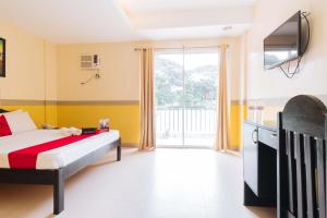Voodi või voodid majutusasutuse RedDoorz Premium @ Gabinete Road Palawan toas