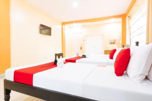 Voodi või voodid majutusasutuse RedDoorz Premium @ Gabinete Road Palawan toas