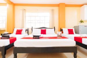 Voodi või voodid majutusasutuse RedDoorz Premium @ Gabinete Road Palawan toas