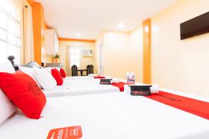 Voodi või voodid majutusasutuse RedDoorz Premium @ Gabinete Road Palawan toas