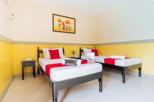 Voodi või voodid majutusasutuse RedDoorz Premium @ Gabinete Road Palawan toas