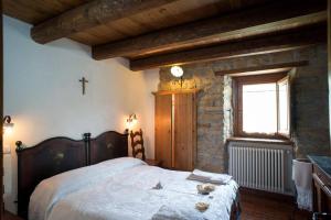 Postel nebo postele na pokoji v ubytování B&b ldl Amatrice