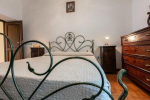 Postel nebo postele na pokoji v ubytování Casale Le Sette Vene