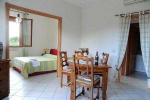Posteľ alebo postele v izbe v ubytovaní Poggio delle Rose Tuscany Relais