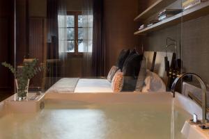 Giường trong phòng chung tại Grau Roig Andorra Boutique Hotel & Spa