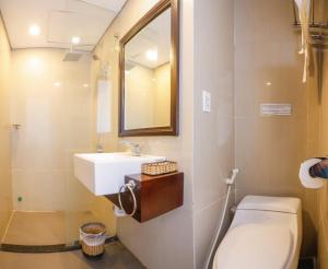 Um banheiro em Zenta Hotel