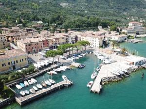 an aerial view of a harbor with boats in the water at Al Lago da Lilly in Gargnano +67 photos