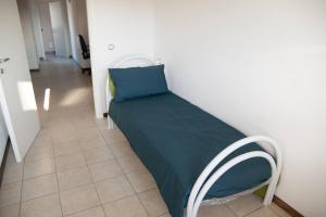 מיטה או מיטות בחדר ב-Gli astri di San Lorenzo