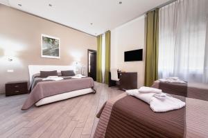 Posteľ alebo postele v izbe v ubytovaní Mia Resort