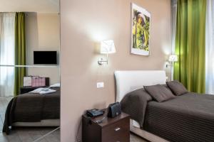 Posteľ alebo postele v izbe v ubytovaní Mia Resort
