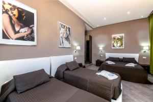 Posteľ alebo postele v izbe v ubytovaní Mia Resort