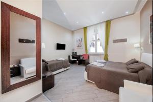 Televízia a/alebo spoločenská miestnosť v ubytovaní Mia Resort