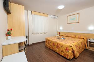 Postel nebo postele na pokoji v ubytování Hotel Express Terminal Tur - Rodoviária Porto Alegre
