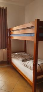 Posteľ alebo postele v izbe v ubytovaní Penzion Dolní Dunajovice