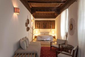 Postel nebo postele na pokoji v ubytování Riad la Cle de la Medina, location en exclusivite