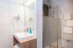 Kúpeľňa v ubytovaní Gasthof-Pension Wulfenia