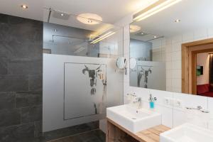Kúpeľňa v ubytovaní Gasthof-Pension Wulfenia