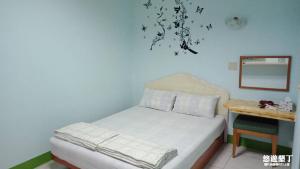 Postel nebo postele na pokoji v ubytování Pthles Guest house