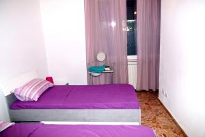 Postel nebo postele na pokoji v ubytování NOEMI & JULIENNE
