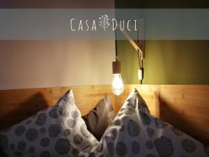 Postel nebo postele na pokoji v ubytování Casa Duci