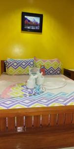 Cama o camas de una habitación en OYO 938 Citrine Travel Lodge
