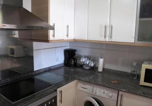 Kuchyň nebo kuchyňský kout v ubytování Apartamento Playa Moncofar - Xilxes