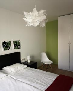 מיטה או מיטות בחדר ב-Green leaf apartments