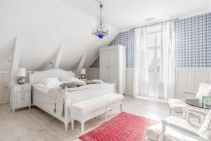 Postel nebo postele na pokoji v ubytování Blommenhof Hotel