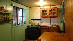 Kuchyň nebo kuchyňský kout v ubytování Hostal La Casa del Carpintero