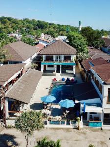 an aerial view of a house with a swimming pool at Dream Divers Resort in Gili Trawangan