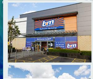 a building with a sign on the side of it at Your Nottingham Vacation, Business Apart, Parking in Nottingham