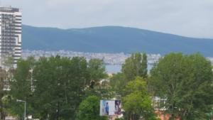a view of a city with trees and a lake at Beautiful Penthouse Apartment in Sunny Beach