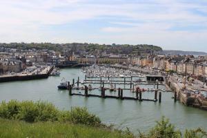 a view of a marina with boats in the water at L'écoutille in Dieppe