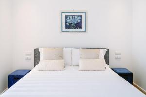 Postel nebo postele na pokoji v ubytování NUMA HOTEL