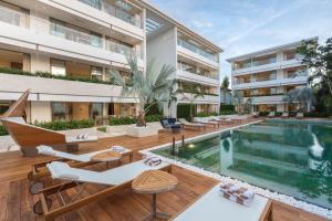 an image of an apartment patio with a swimming pool at Chi - The Residence in Bophut