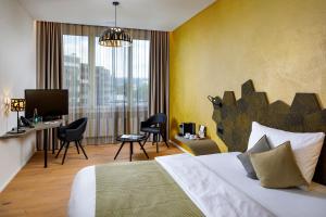 Letto o letti in una camera di Focus Hotel