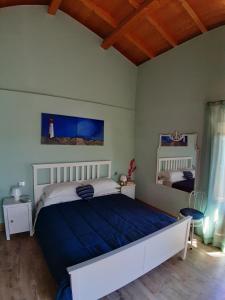 Postel nebo postele na pokoji v ubytování L.T. METIS