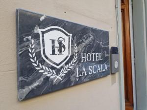 Certifikát, hodnocení, plakát nebo jiný dokument vystavený v ubytování Hotel la Scala