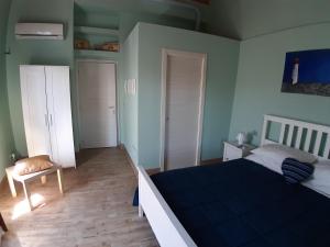 Postel nebo postele na pokoji v ubytování L.T. METIS