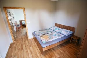 Postel nebo postele na pokoji v ubytování Penzion u Vinice