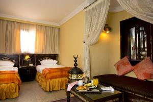 Кровать или кровати в номере Oriental Rivoli Hotel & Spa