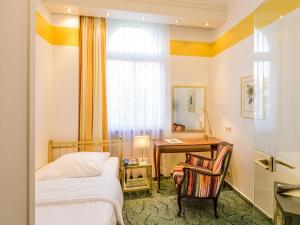 Postel nebo postele na pokoji v ubytování Hotel Palmenhof