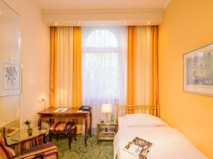 Postel nebo postele na pokoji v ubytování Hotel Palmenhof