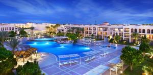 an aerial view of a resort with two pools at JAZ Mirabel Resort in Sharm El Sheikh