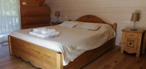 Postel nebo postele na pokoji v ubytování Chalet le Dorf