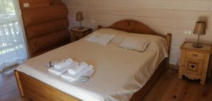 Postel nebo postele na pokoji v ubytování Chalet le Dorf